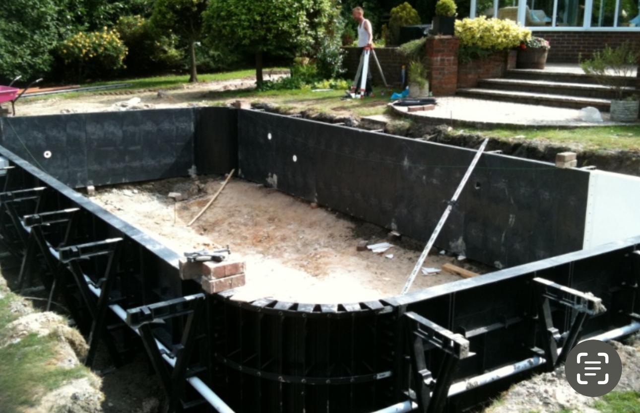 Swimming pool structure taking shape during construction